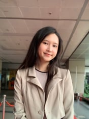 A person smiling at the camera

Description automatically generated, Picture