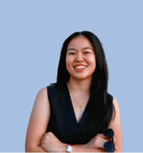A person smiling with arms crossed

Description automatically generated, Picture