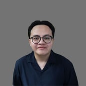 A person wearing glasses and a blue shirt

Description automatically generated, Picture