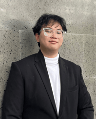 A person in a suit

AI-generated content may be incorrect., Picture