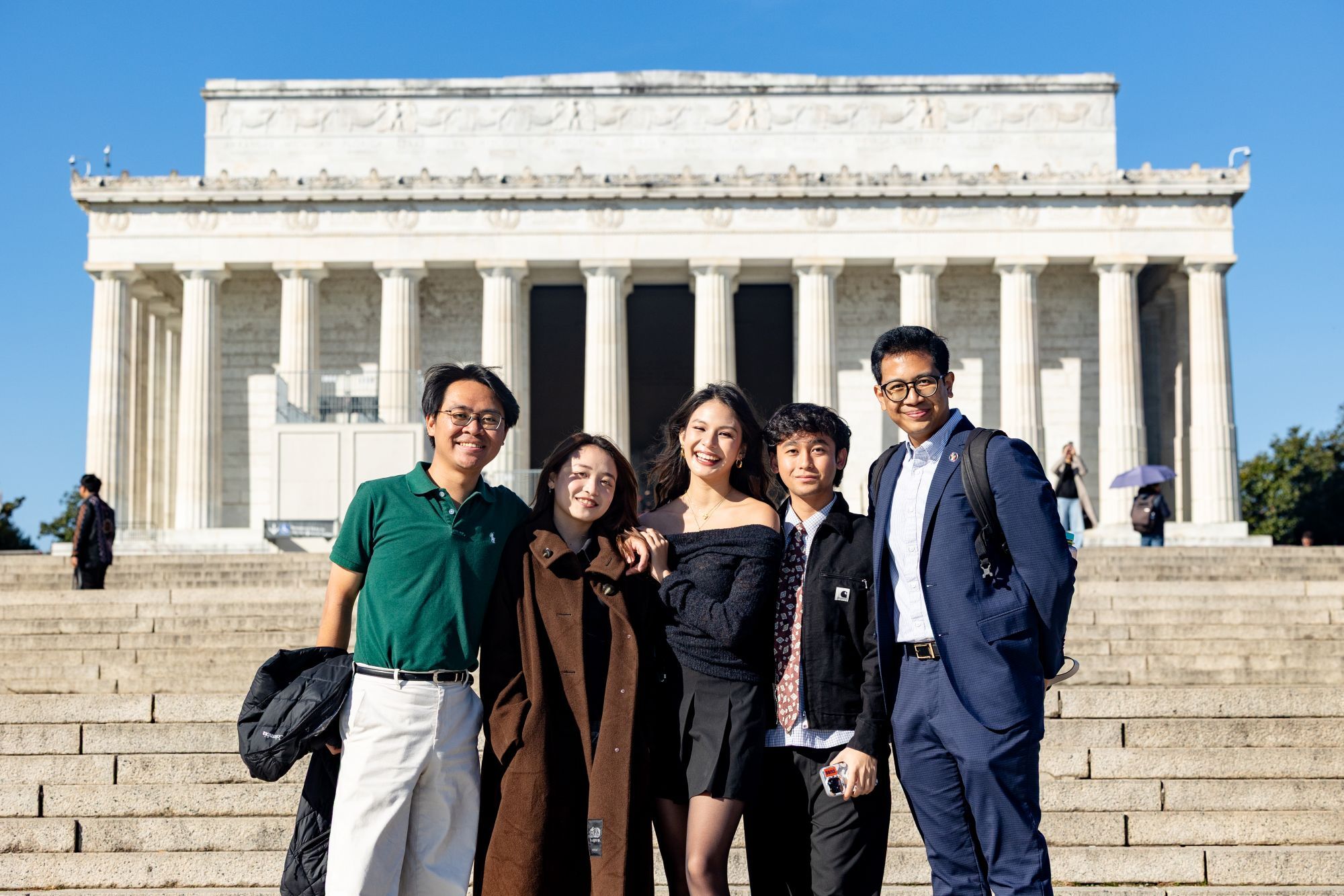 A group of YSEALI participants standing in front of the Lincoln Memorial in Washington D.C.